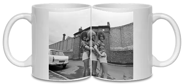 Paper dolls in hot pants for prison visit. 1971