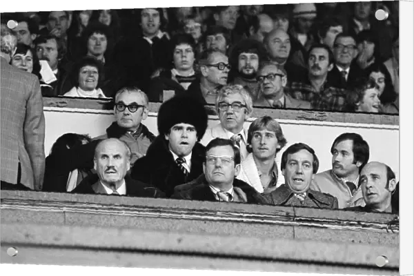 Elton John watching the Watford v Gillingham football match. 11th November 1978