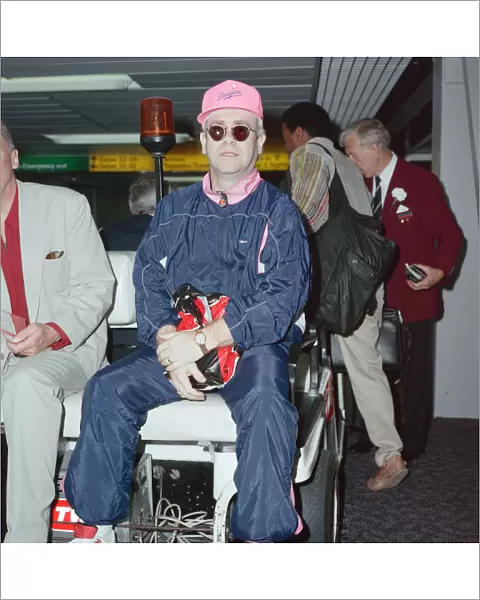 Elton John at London Heathrow Airport. 18th July 1990