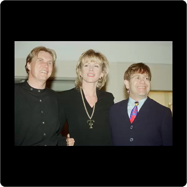 Theo and Louise Fennell with Elton John at the opening of 'Theo Fennell s'