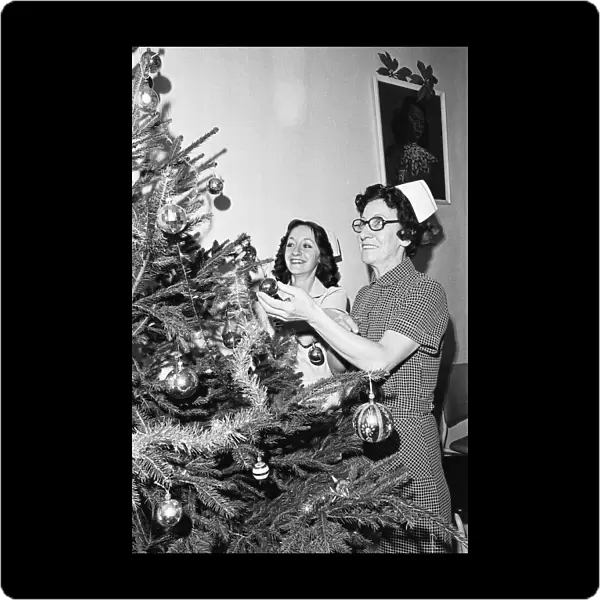 Nurses decorate Christmas tree at Brotton Hospital, Middlesbrough. Circa 195