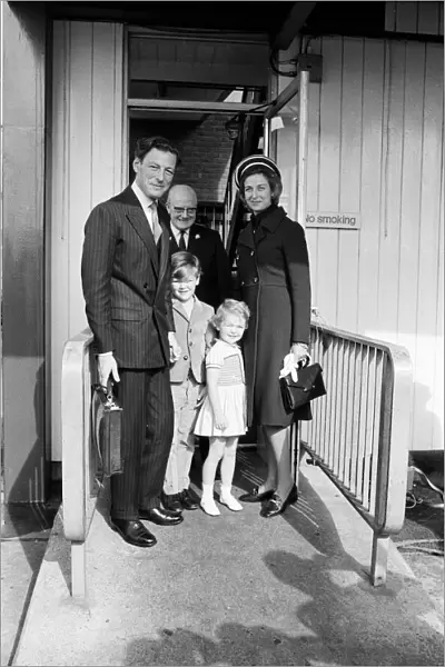 Princess Alexandra and her husband Angus Ogilvy at Heathrow Airport with their children
