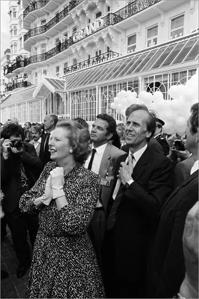 Prime Minister Margaret Thatcher and Conservative Chairman Norman Tebbit return to