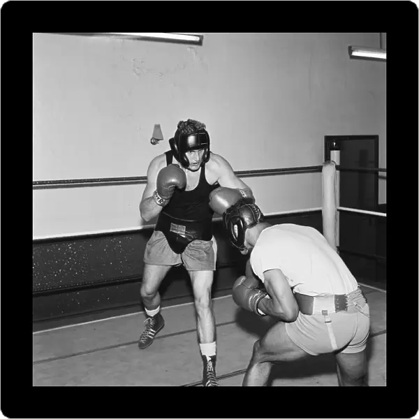 Light heavyweight boxer John Conteh (right) sparring with Joe Bugner