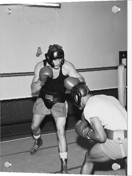 Light heavyweight boxer John Conteh (right) sparring with Joe Bugner