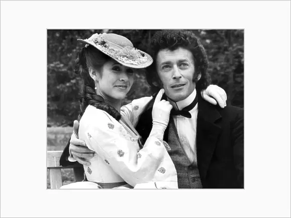 CARRIE FISHER (1956-2016) Robert Powell with Carrie Fisher in costume filming