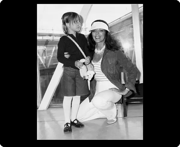 Joan Collins and daughter Katyana at Heathrow airport - April 1978