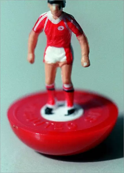 A SUBBUTEO PLAYER IN A RED FOOTBALL STRIP 01  /  06  /  1990