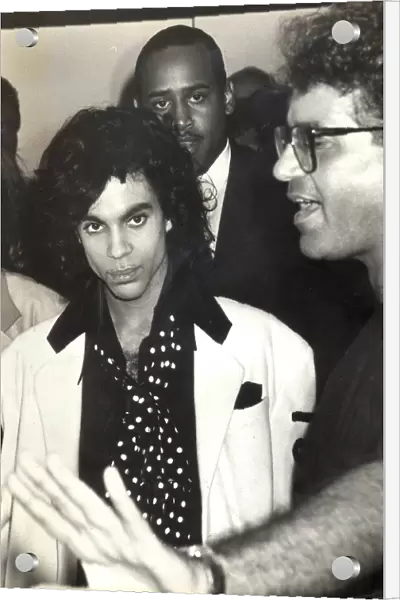 POP STAR PRINCE UNDER PROTECTION AT HEATHROW AIPORT, JUNE 1988