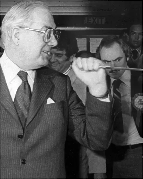James Callaghan holding knife up before cutting cake - April 1979 24  /  04  /  1979