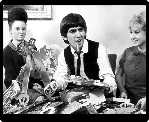 George Harrison and Beatles fan club secretaries Anne Collingham & Bettina Rose opening