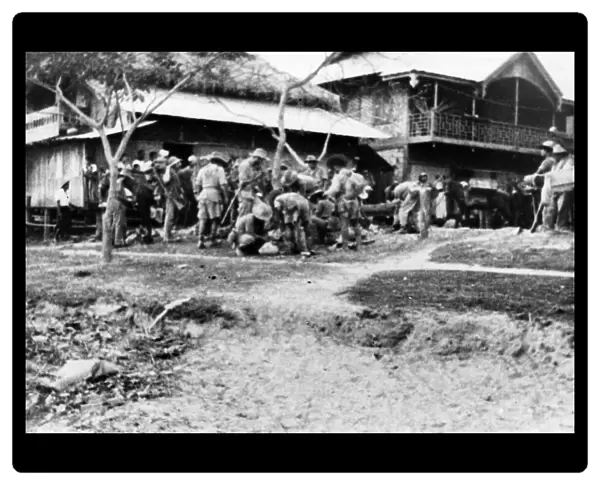 Chindits buying food in a Burmese village in 1943