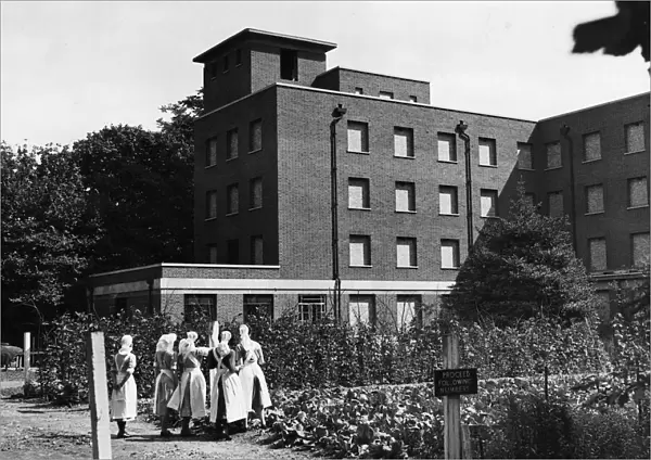 Nurses outside Queen Charlottes Hospital in Shepherds Bush