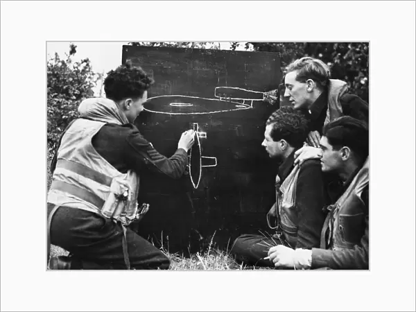 Flight Sergeant M. Rose teaches fighter pilots about flying bombs. 29th June 1944