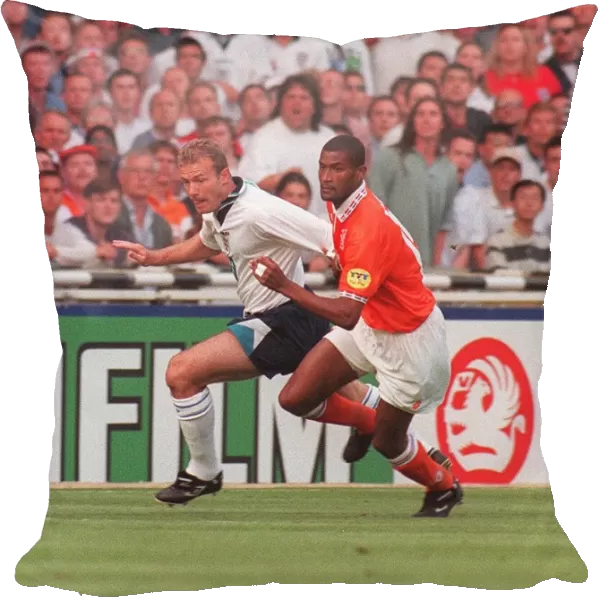 Englands Alan Shearer and Hollands Winston Bogarde battle for the ball during the England