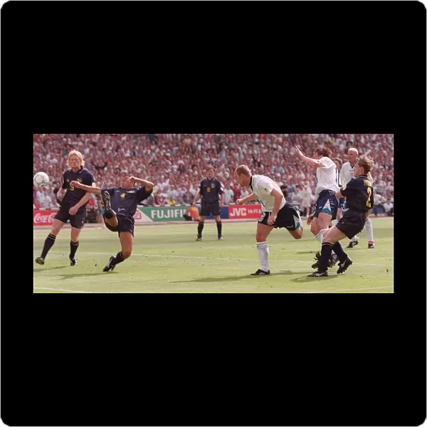 ALAN SHEARER HEADERS THE BALL TO SCORE HIS GOAL FOR ENGLAND AGAINST SCOTLAND IN THEIR