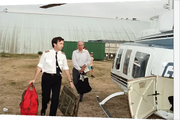 Rupert Murdoch getting in to a helicopter. 6th August 1994