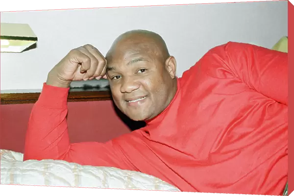 George Foreman pictured in a hotel room. 22nd September 1990