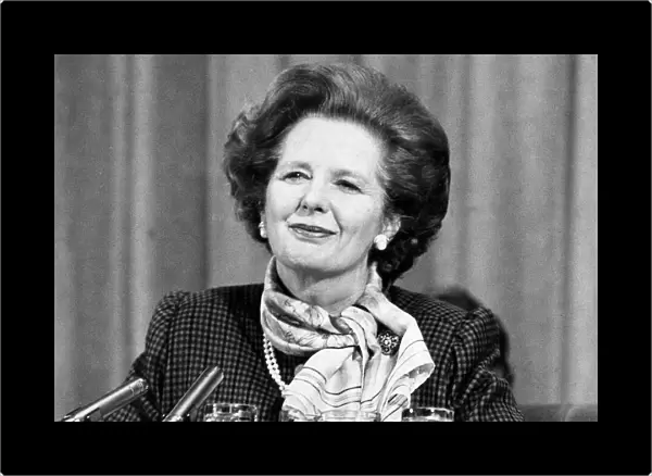 Margaret Thatcher smiling during press conference - January 1985