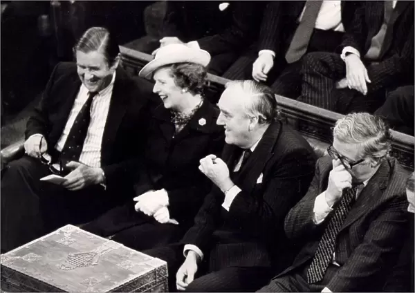 Margaret Thatcher with William Whitelaw and Sir Geoffrey Howe laughing on front bench in