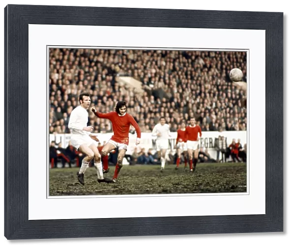 George Best of Manchester United seen here in action against Paul Reaney of Leeds circa