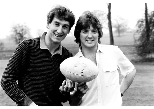 Terry Butcher and Russell Osman of Ipswich March 1981 holding rugby ball