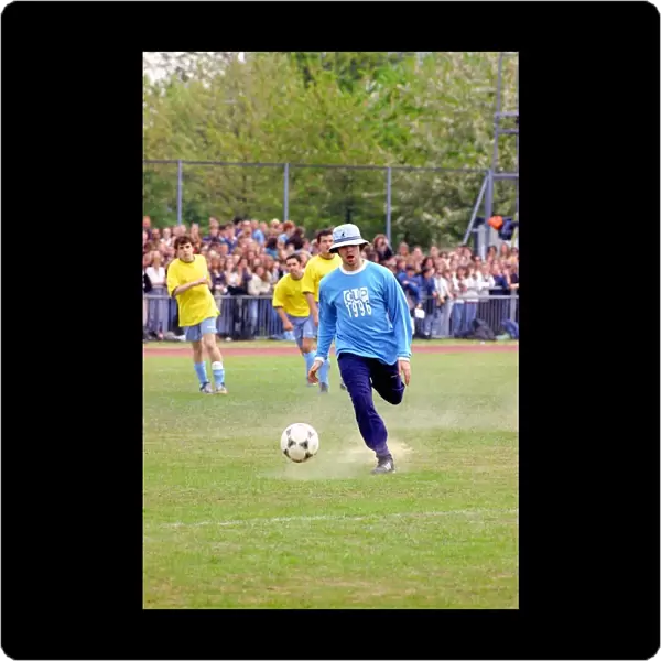 Liam Gallagher kicking football - May 1996 Oasis and Blur come head to head in
