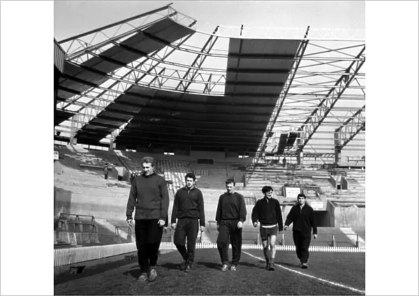 Manchester United Football Players training under the new cantilever stand at Old