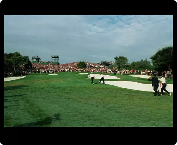 Players Approach 14th Green