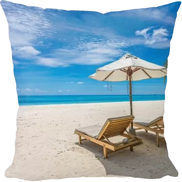 Beach umbrella and chairs for summer couple vacation, holiday, honeymoon travel destination. Luxury beach landscape sea view. Tropical island resort