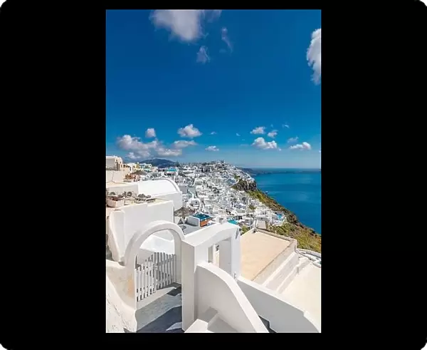 Santorini Island, filled with cafes and hotels overlooking the Aegean Sea and volcanic Caldera. Luxury summer travel and vacation destination of white