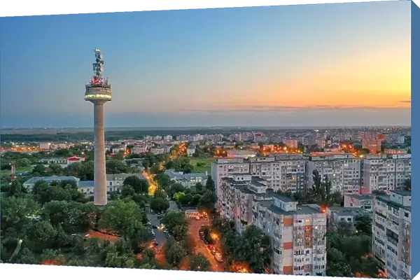 Galati, ROMANIA - July 22, 2021: Aerial view of Galati City, Romania. Night city lights after sunset at blue hour