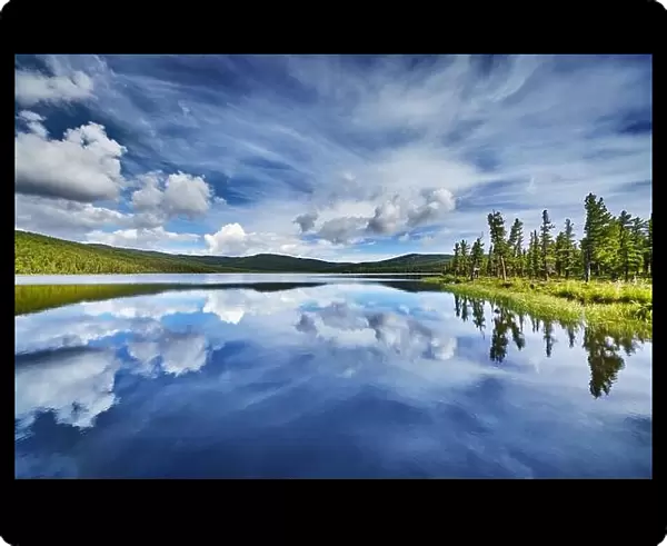 Beautiful still lake with reflection in Altai mountains