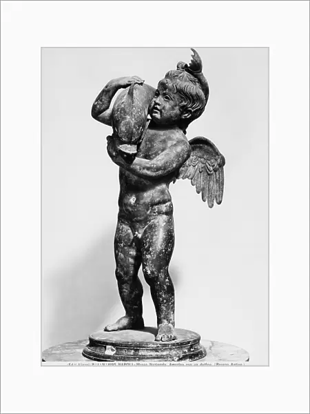 Cupid with Dolphin; small statue coming from Pompeii kept in the National Archaeological Museum in Naples