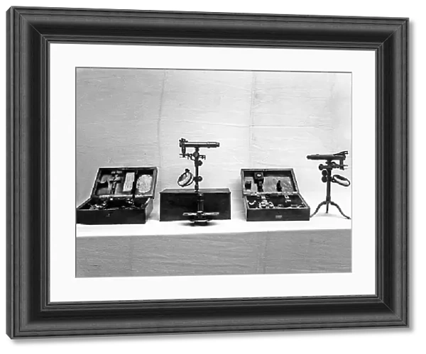 The image shows cattotropic microscopes of the scientist Giovan Battists Amici, with drawers and accessories, in the foreground is an ocular micrometer, with double images. Currently the instruments are preserved in the Museum of Science History of Florence. The picture was taken during the Exhibition of Science History in 1929, in Florence