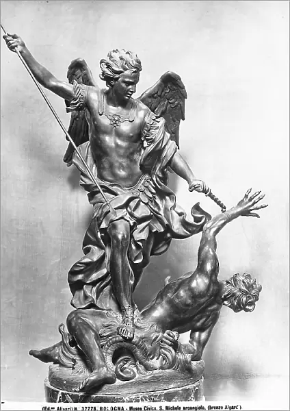 Bronze sculpted group with the Archangel St. Michael, work of art of Alessandro Algardi during his mature age for the Church of S. Michele in Bosco at the Medieval Civic Museum in Bologna