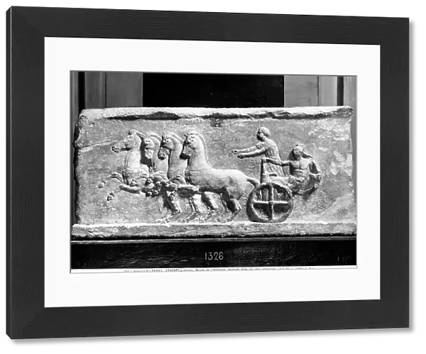 The frieze shows a race of an athlete with a chariot pulled by horses. Museum of the Acropolis, Athens