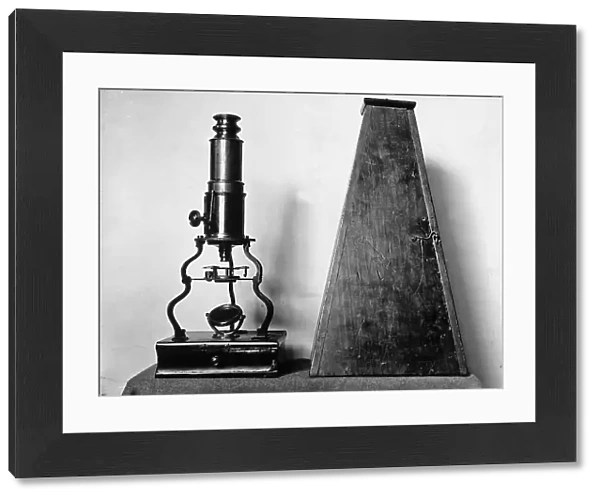 Vertical microscope dating back to the eighteenth century. The picture was taken during the Exhibition of Science History in 1929, in Florence
