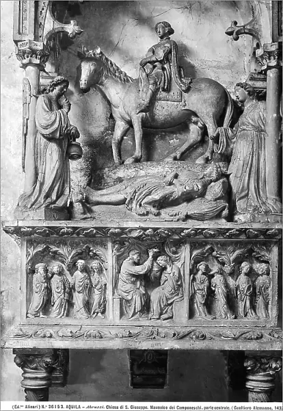 The Camponeschi Monument, located in the Church of St. Giuseppe (formerly St. Biagio) in L'Aquila. Ark supported by spiral columns with lions. On the front is a high relief depicting the Coronation of Mary and the Apostles. Above the ark is a curved shrine with a pointed arch, in which an equestrian statue of Ludovico Camponeschi and the prone figure of Lalle, with two angels at the side