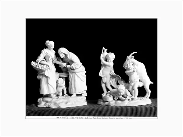 Two porcelain statuettes representing female figures and putti, Collection of Count Segr Sartorio in Trieste
