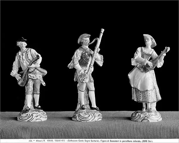 Three statuettes with musical instruments, Collection of Count Segr Sartorio in Trieste