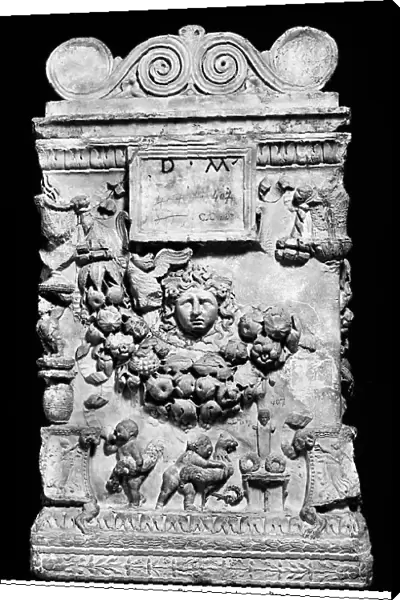 Memorial stone on which a mask, a festoon and two putti playing with roosters are sculpted. Lateran Museum, Rome. Today in Gregoriano Profano Museum (formerly Lateran Museum), Vatican Museums, Vatican City