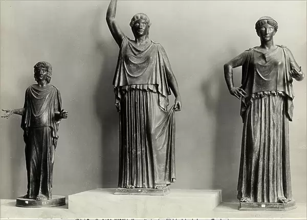 Three bronze statues of actresses found in Herculaneum, now located at the National Archaeological Museum in Naples