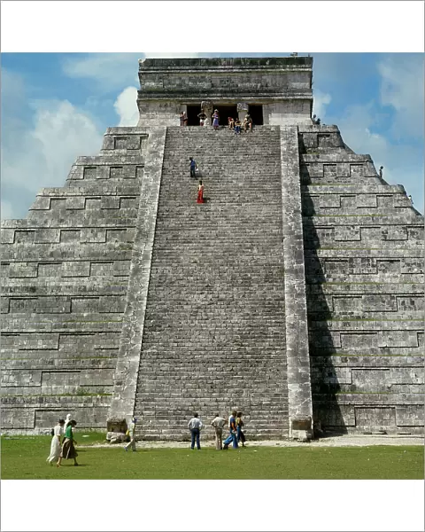 Chichen Itza: the pyramid, called 'Of the Castle', seen from earth. It is the most important building of this ancient city. It was consecrated to the worship of the god Kukulcan and built according to the rites of mysterious symbols and astronomical solar