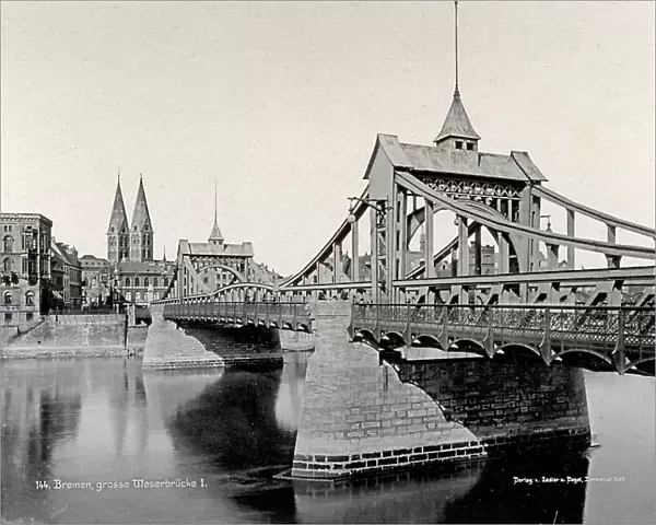 Wilhelmkaiser-Brcke, bridge over the Weser river in Bremen. In the background the bell towers of the Cathedral