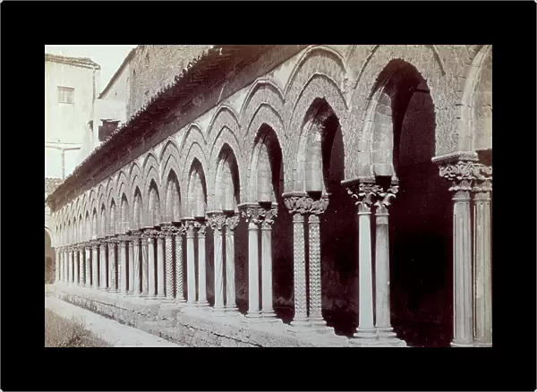 Portion of the cloister of the Cathedral of Monreale: the ogive arches of the portico are supported by twinned columns with capitals of rich and varied decoration