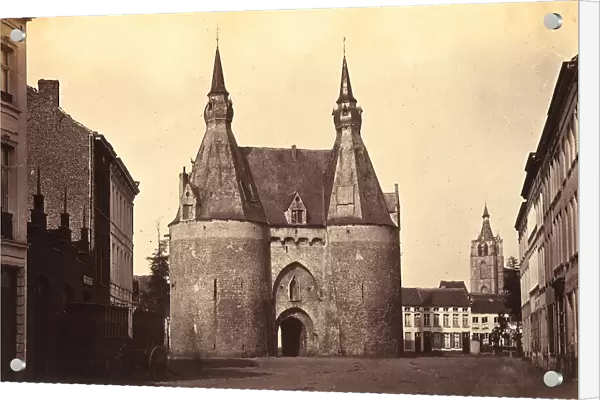 View of Brusselspoort, ancient city gate of Mechelen, formed by two cylindrical turret masts with a conic roofing