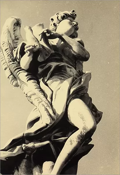 Angel with scroll located on the Sant'Angelo Bridge in Rome. The work is by Giulio Cartari and is a copy of the Bernini original