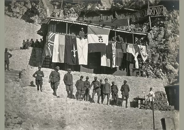 World War I: Group of officers at the front of the flags of the Allied war Italian exhibit