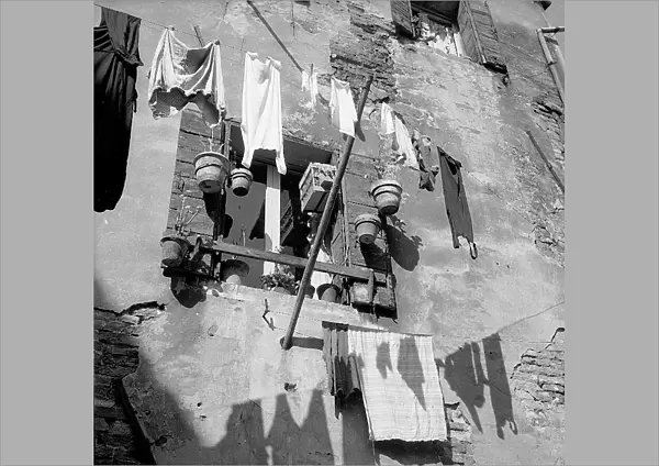 Laundry hung from a window, Venice